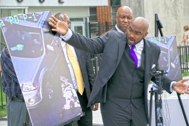 Attorney Damario Solomon-Simmons gestures toward an enlarged image taken from Tulsa Police Department footage of the shooting of Terence Crutcher. Crutcher's attorneys say the images show Crutcher's window was rolled up during the shooting. DYLAN GOFORTH/The Frontier